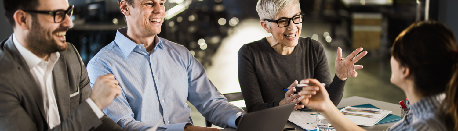 happy business team working at a desk